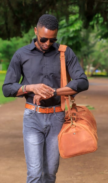 Custom-made, light brown leather duffle bag