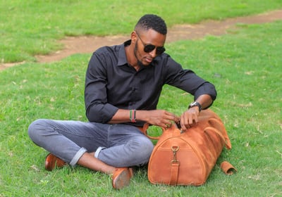 Custom-made, light brown leather duffle bag