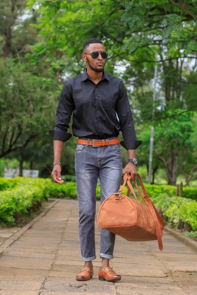 Custom-made, light brown leather duffle bag