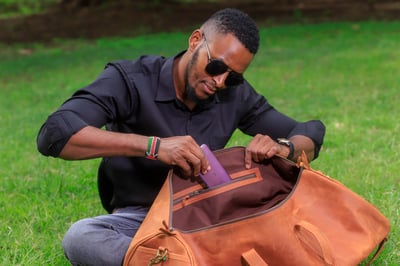 Custom-made, light brown leather duffle bag