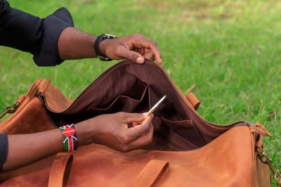 Custom-made, light brown leather duffle bag